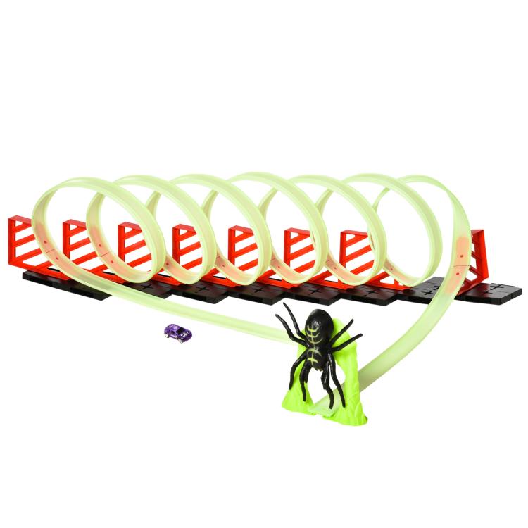 Kids glowing race track with lime loop rails, red striped barriers, and spider figure