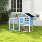 Light blue and white outdoor rabbit hutch with wire doors and black roof