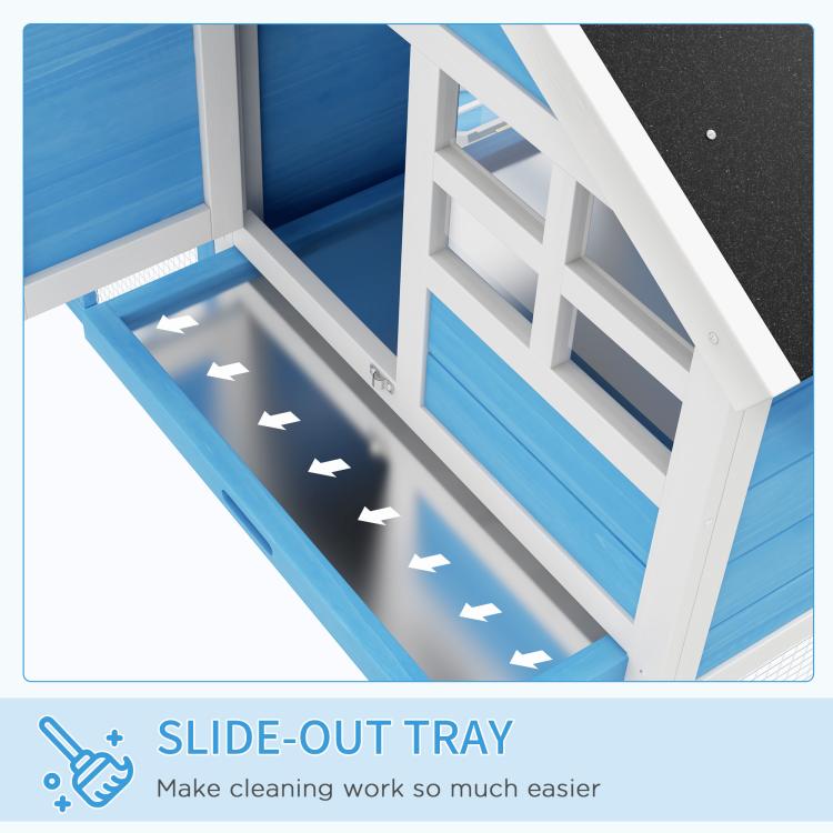 Rabbit hutch interior view with slide-out tray under black roof opening