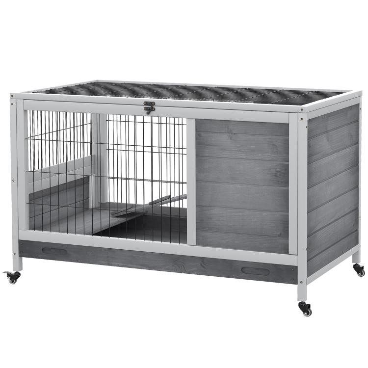 Wooden indoor pet hutch with wire mesh door, enclosed side panels, and rolling wheels