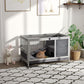 Indoor elevated wooden rabbit hutch with wire mesh sides and hinged dark door panel