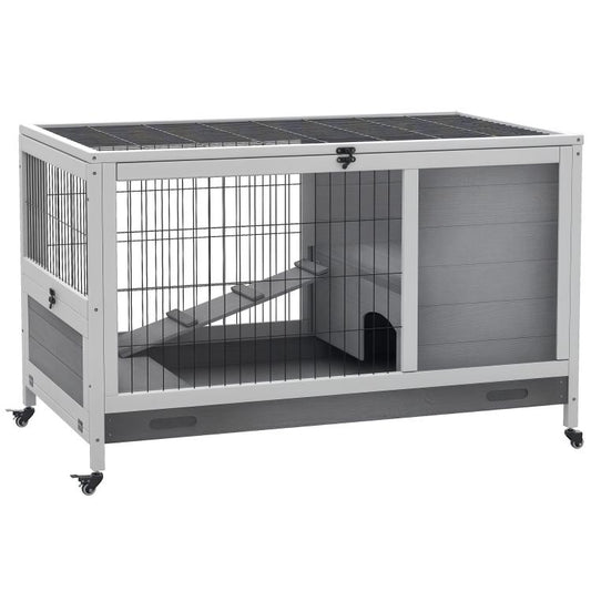 Elevated wooden rabbit hutch with wire front panel, dark ramp, and enclosed run