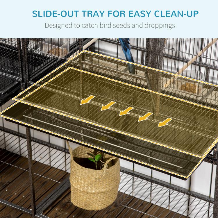 Slide-out tray for bird cage with wire grate, seed-filled catch tray