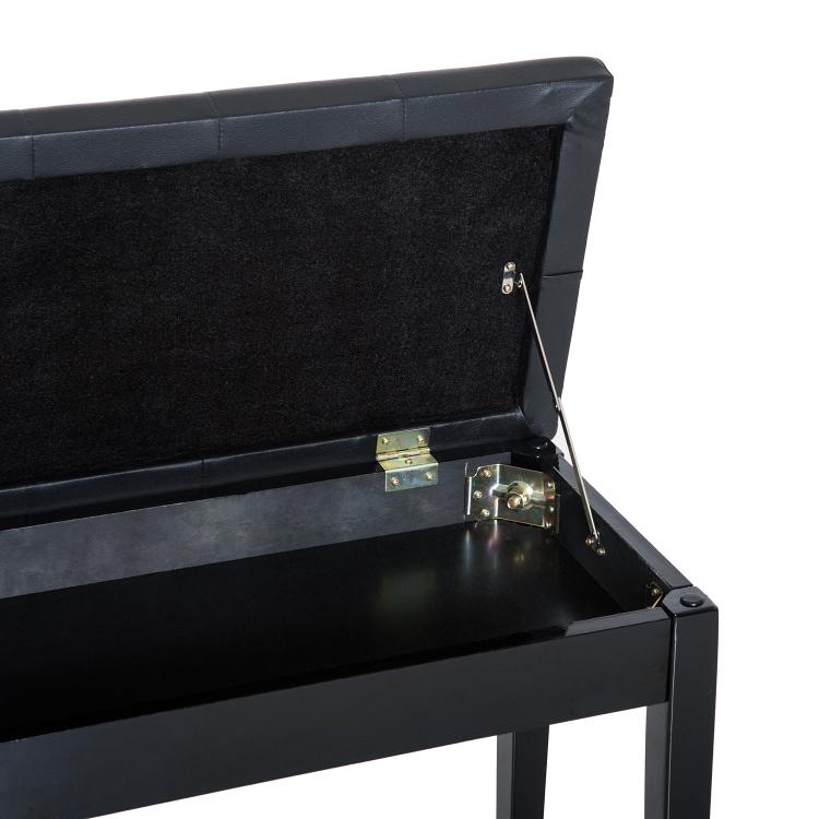Black piano bench with hinged lid and padded faux-leather top