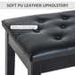 Black faux leather bench seat with button-tufted cushion detail