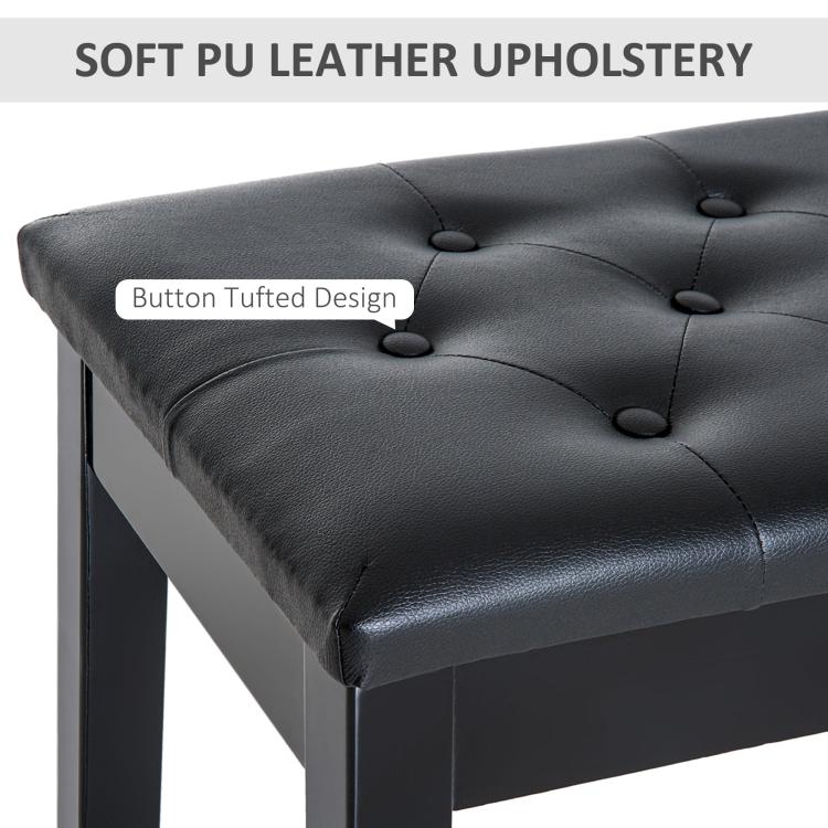 Black faux leather bench seat with button-tufted cushion detail