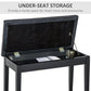 Black piano bench with under-seat storage compartment and hinged lid