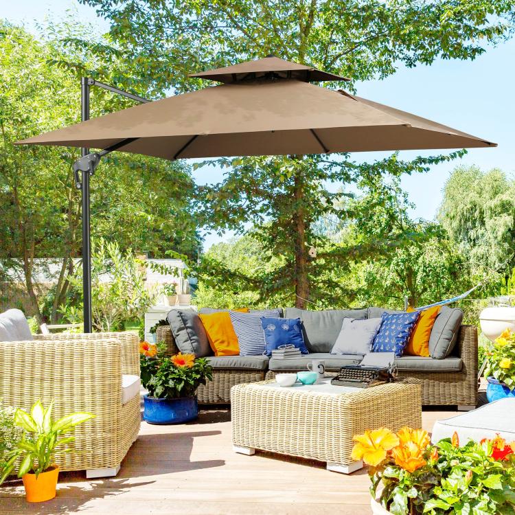 Coffee brown cantilever patio umbrella open over outdoor lounge furniture