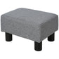 Gray square ottoman foot stool with textured fabric cover and black plastic legs