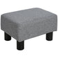 Gray cube ottoman foot rest with four black plastic legs
