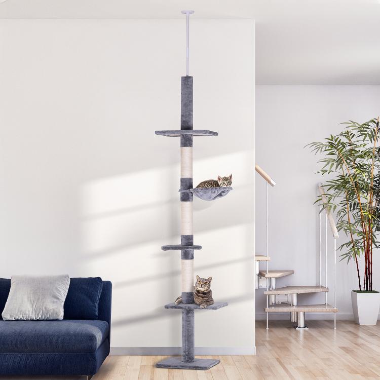 Gray floor-standing cat tree with hammock and stacked scratching posts