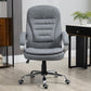 Grey high-back executive office chair with thick seat padding and swivel base on casters