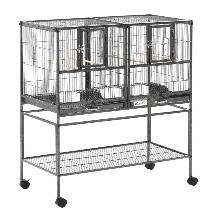 Metal bird cage with black frame, front door, rolling stand and lower shelf