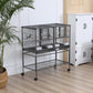 Divided metal bird cage on wheeled stand with double doors and wood perches
