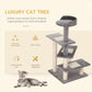 Grey cat tree tower with round top perch and three cushioned steps on sisal posts
