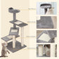 Grey cat tree with plush top perch, sisal posts, and three carpeted scratching platforms