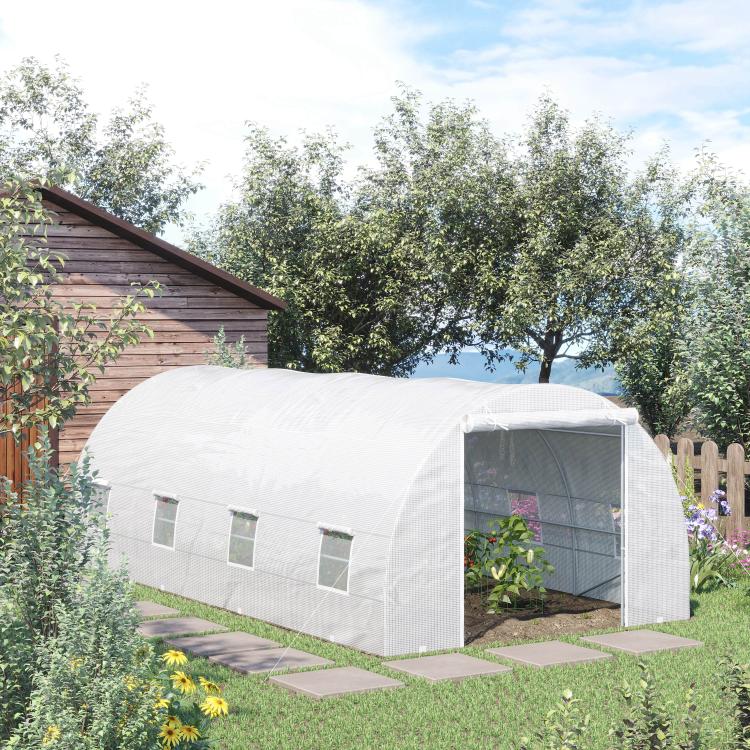 White tunnel greenhouse with zippered front door and side mesh window panels