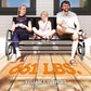 3-seat outdoor glider bench with dark mesh seat and black metal support frame