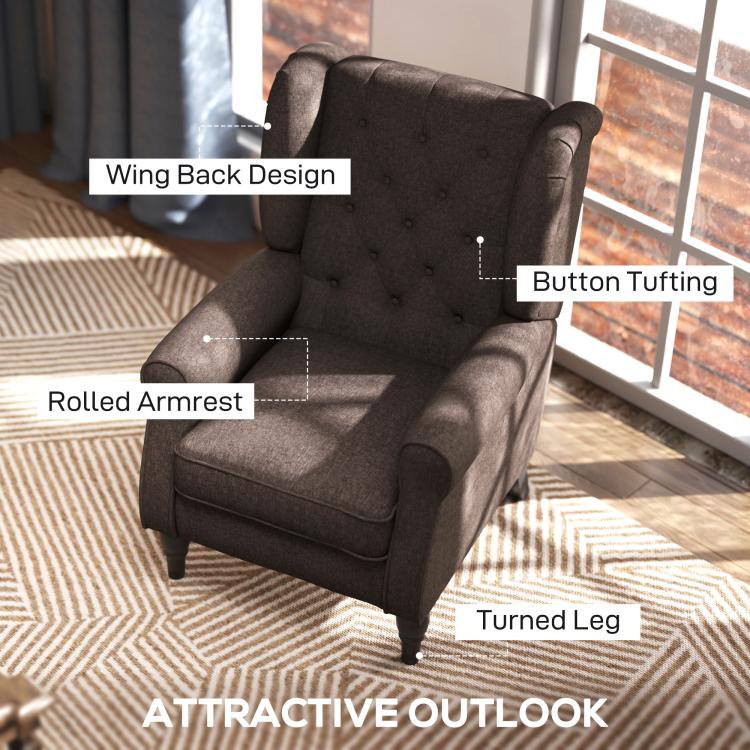 Wingback lounge chair showing button tufting, rolled armrests, and turned legs