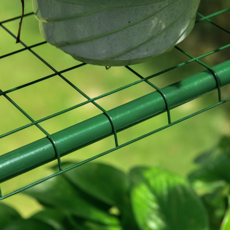 Mini walk-in greenhouse kit frame in green metal grid with plastic cover clips