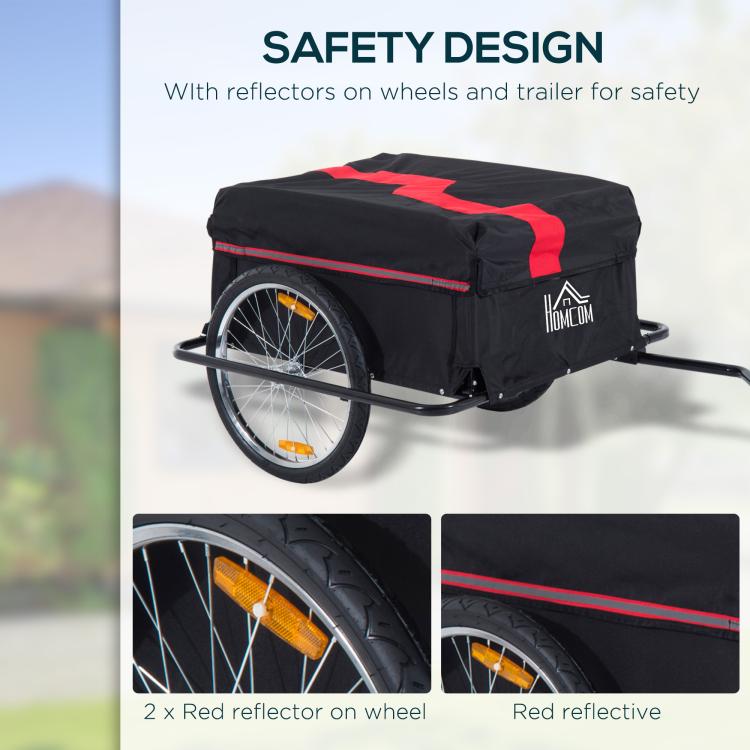 Bicycle cargo trailer with red stripe, black cover, and wheel reflectors