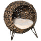 Round woven cat bed with dark brown basket weave and beige cushion