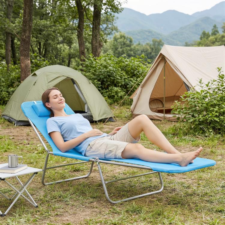 Outdoor folding chaise lounge chair with blue mesh seat, reclining back and head pillow