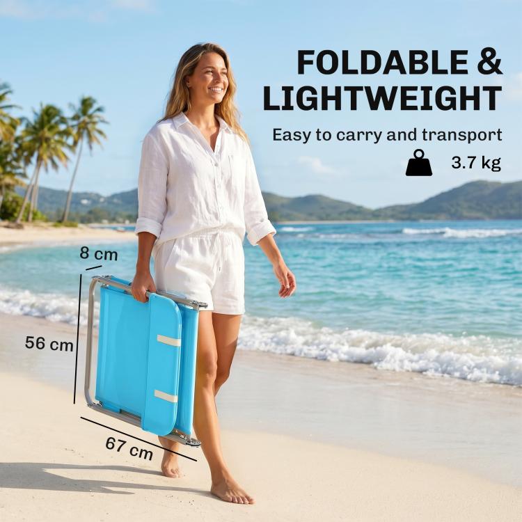 Blue folding chaise lounge chair with pillow, shown being carried for transport