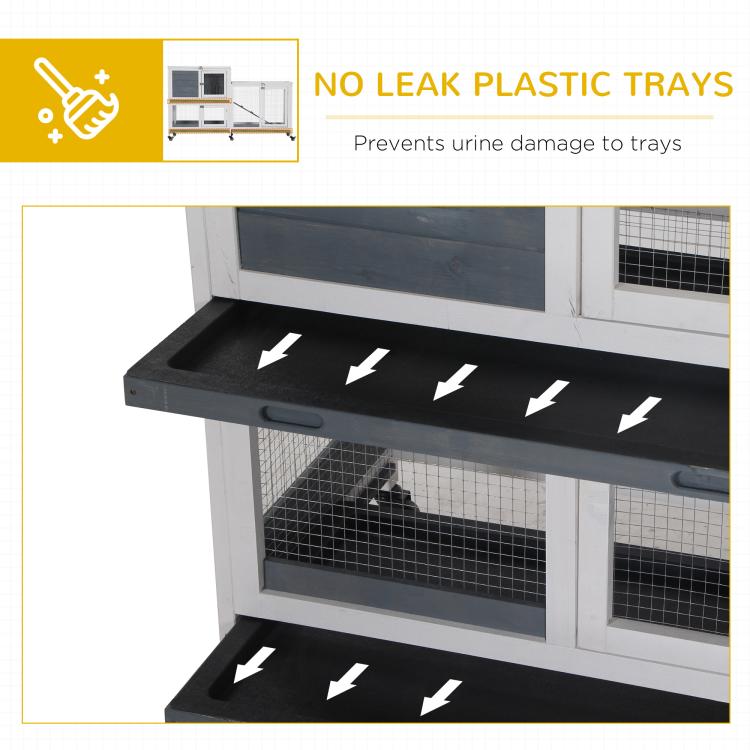 Rabbit hutch with bottom plastic trays and wire mesh fronts, white frame, caster wheels