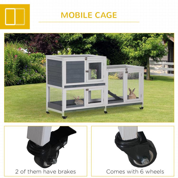 Rabbit hutch on rolling wheels with two enclosed levels, white frame and wire mesh doors
