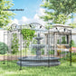 Black metal folding garden fence border around raised bed with scroll top