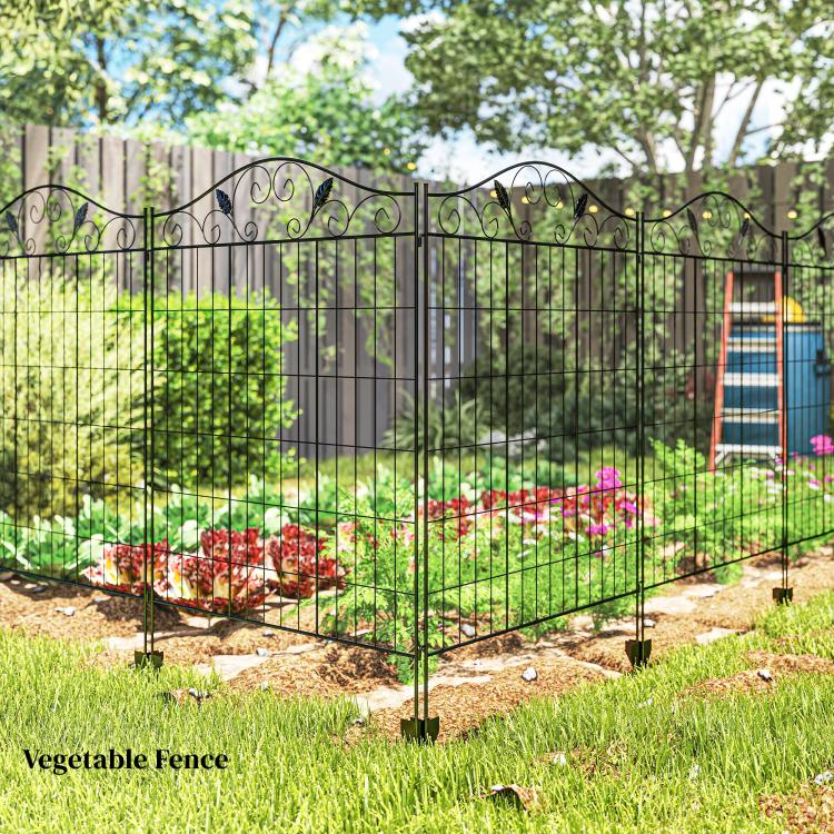 Black metal folding garden fence for vegetable rows with pointed ground stakes