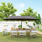 Gray patio umbrella with wide canopy over an outdoor dining table