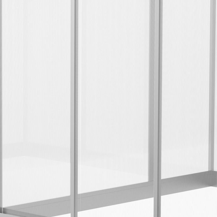 Greenhouse interior wall with clear polycarbonate panels and vertical aluminum supports