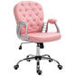 Pink button-tufted desk chair shown in side view with padded armrests and wheels