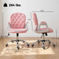 Pink button-tufted desk chair with padded armrests and chrome base, size diagram