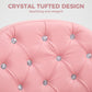 Pink button-tufted chair back with sparkling crystal-style buttons