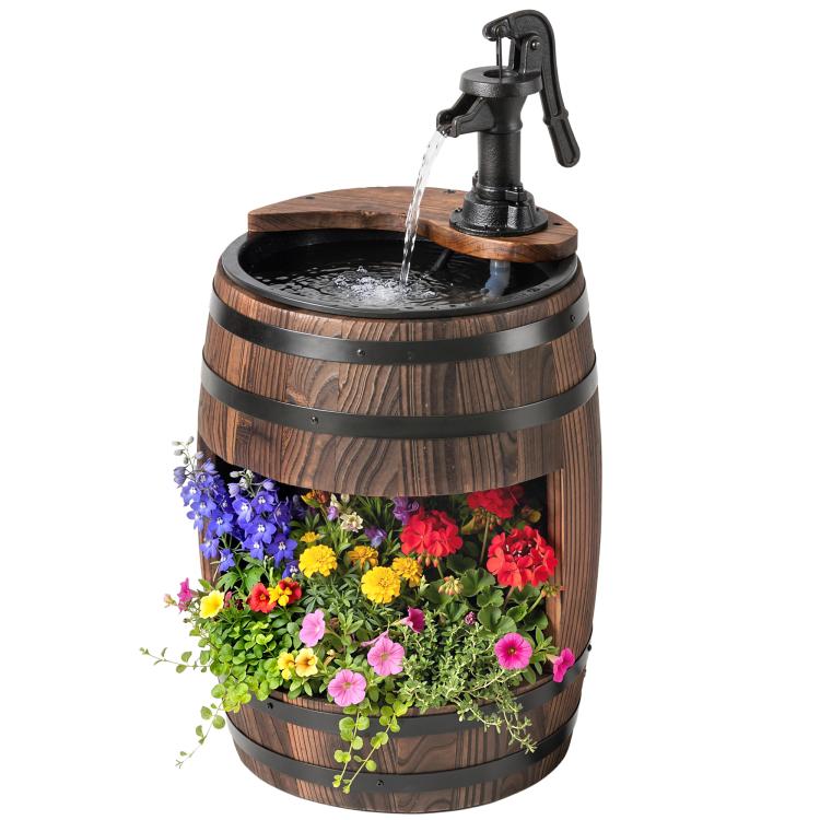 Rustic wooden barrel water fountain with black pump, stream pouring into top basin