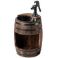 Rustic wooden barrel water fountain with hand pump and circular basin top
