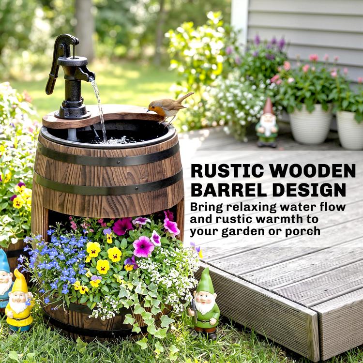 Rustic wooden barrel water fountain with black pump, stream flowing from top reservoir into basin