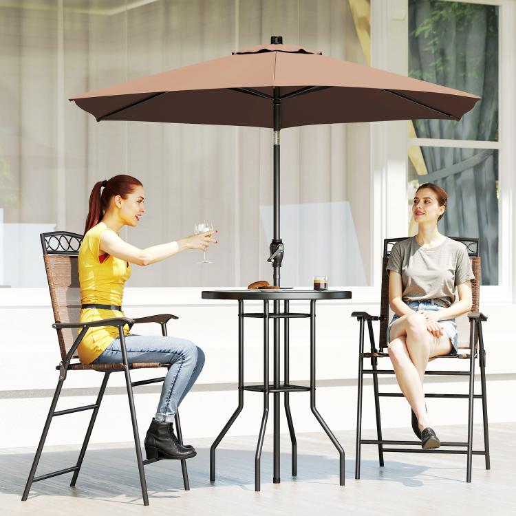 Brown outdoor bar set with umbrella, round tempered glass table, and two folding chairs