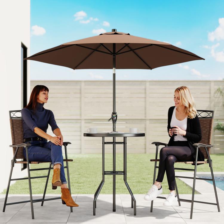 Patio bar set with brown umbrella over wave glass table and two folding chairs