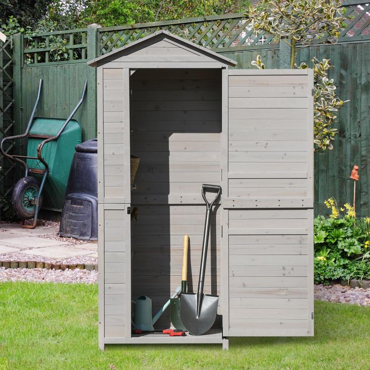 White wooden garden storage cabinet shed with open doors and shovel and tool storage
