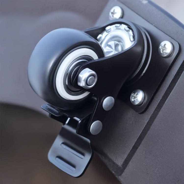 Black umbrella stand base with tilt strap and pole clamp hardware, close-up
