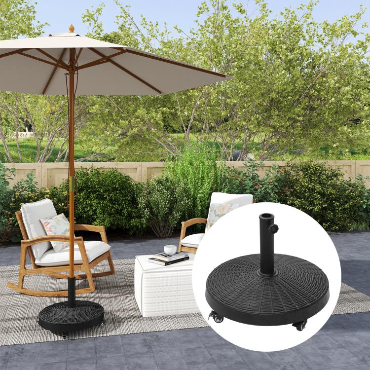 Umbrella base stand with round woven top and caster wheels beside patio furniture