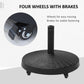 Black umbrella base stand showing four wheels with brakes and woven top