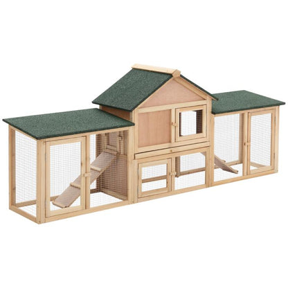 Two-story wooden rabbit hutch with three run areas and green shingle roofs