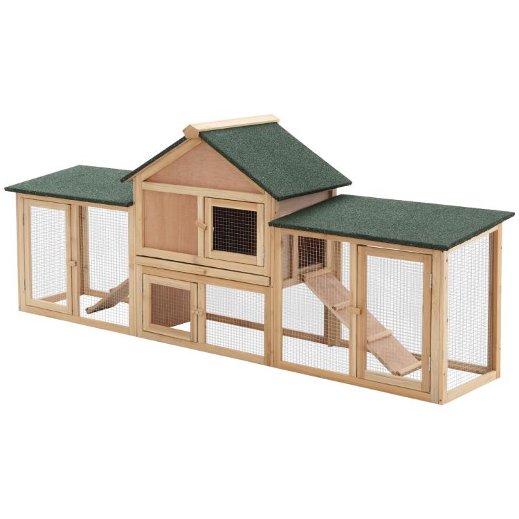 Two-story wooden rabbit hutch with side runs and green shingle roof panels