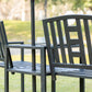 Black metal patio bench with slatted seats and middle table, umbrella-hole pole