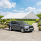 White heavy-duty carport canopy with galvanized steel frame and open sidewalls